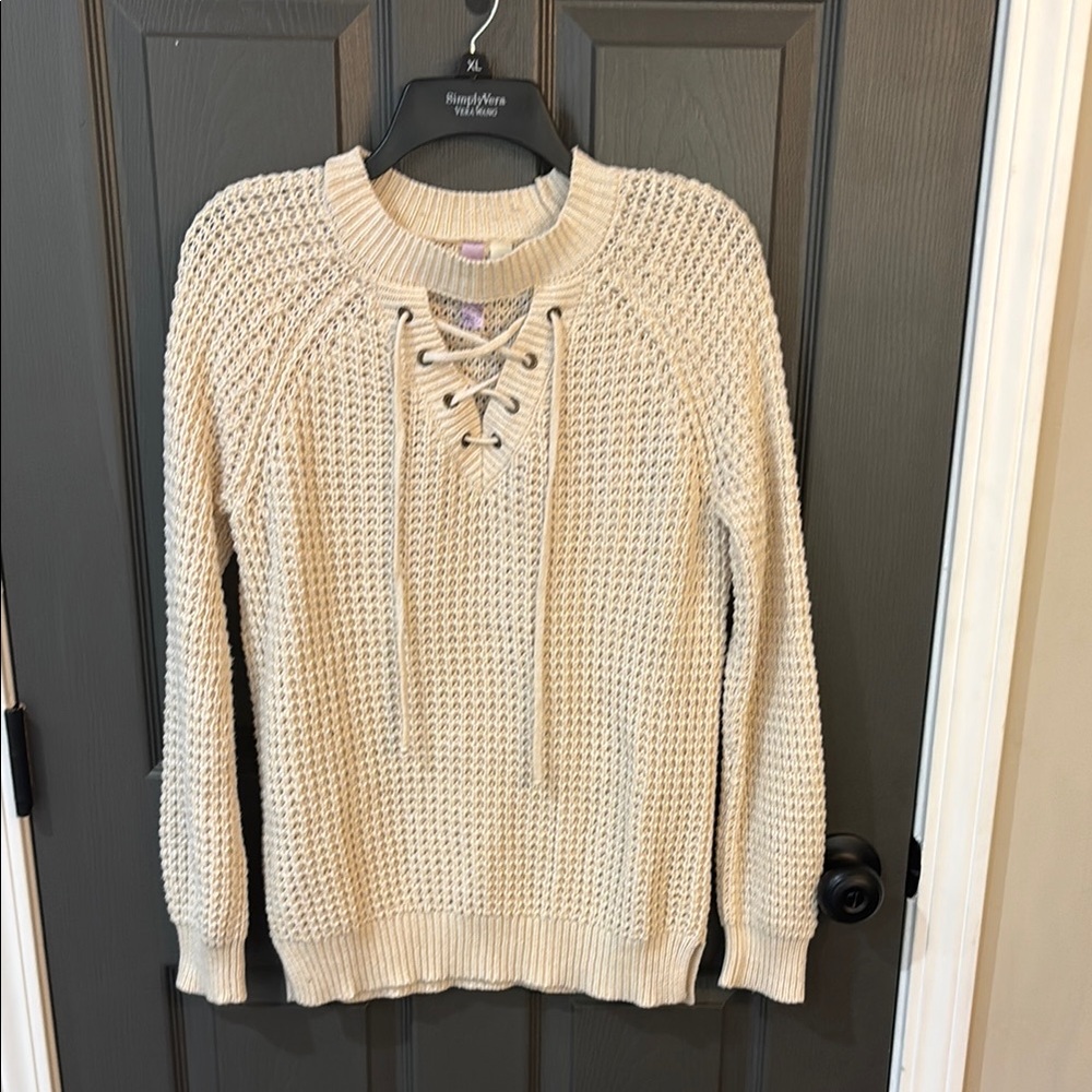 Elegant Cream Lace-Up Sweater